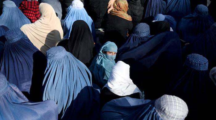 UN urges Afghan Taliban to end arrests of women over dress rules