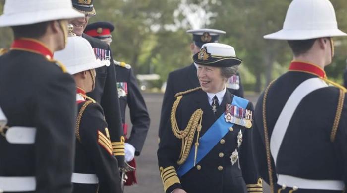 Princess Anne visits the engine room of naval training