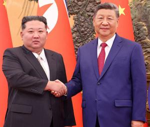 China's Xi lands in North Korea for rare visit