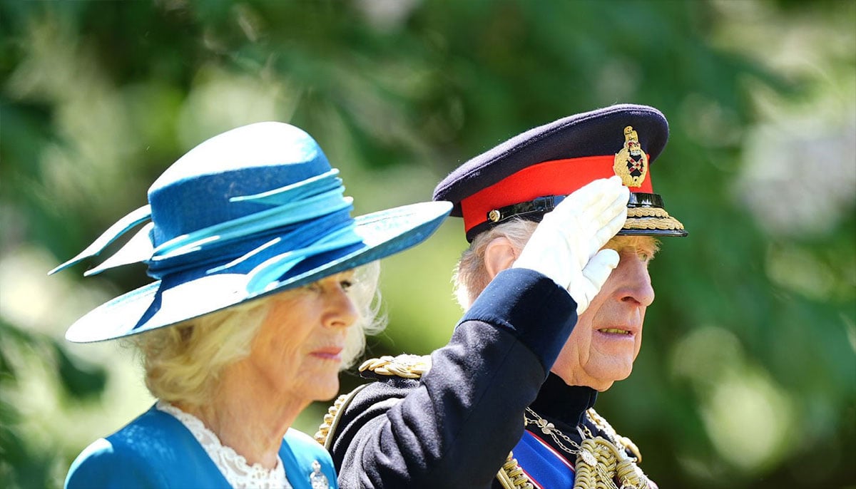 King Charles and Queen arrive to present new colours to Grenadier Guards