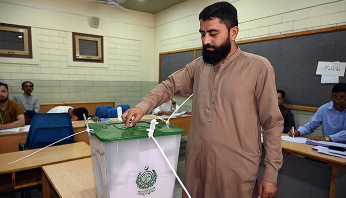CEC withholds final results, orders re-polling in multiple constituencies 11 A voter casts his vote at a polling station during the Gilgit-Baltistan General Elections 2026. — APP