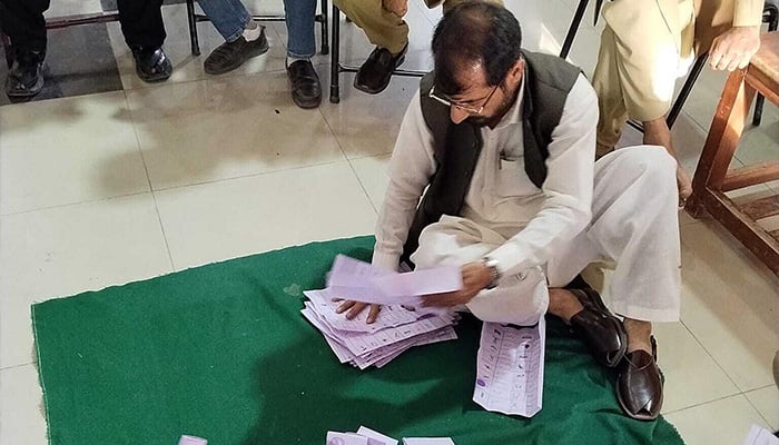 Vote counting is underway at a polling station during the final phase of the Gilgit-Baltistan General Elections 2026. — APP