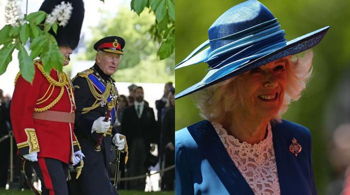 King Charles and Queen arrive to present new colours to Grenadier Guards 