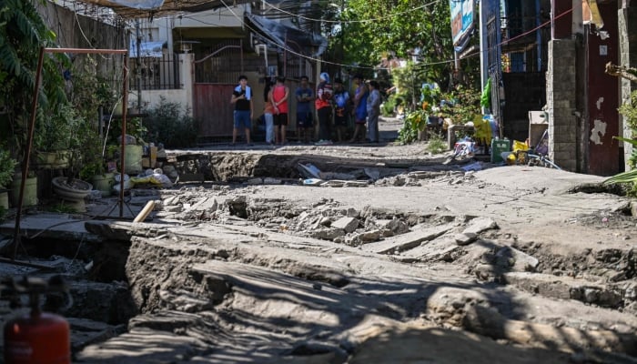 This photo shows a damaged road after a 7.8 magnitude earthquake in General Santos City on June 9, 2026. — AFP