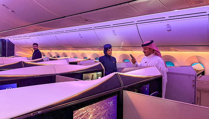 Saudi-backed Riyadh Air lands maiden flight as Iran conflict rages 10 A man speaks with a hostess aboard a Boeing 787-9 Dreamliner aircraft of Saudi airline Riyadh Air at King Khalid International Airport in Riyadh on June 7, 2026. — AFP
