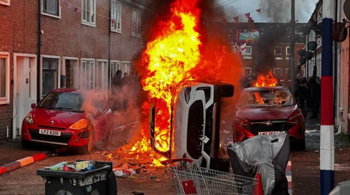 Belfast stabbing sparks anti-immigrant violence across UK after Sudan man charged