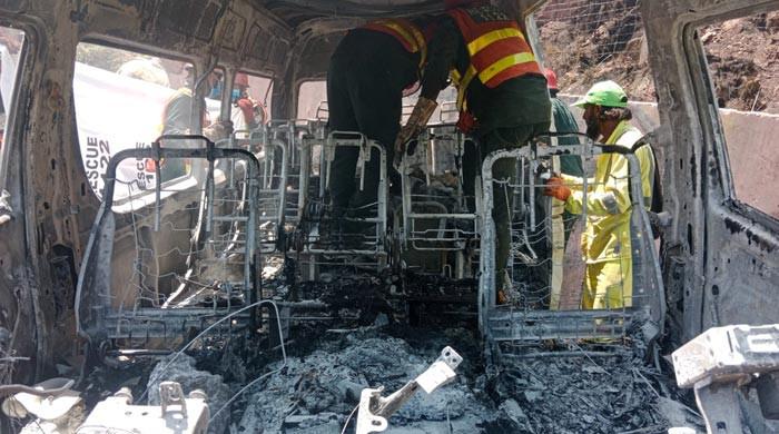 At least 10 killed, 13 injured after tourist van catches fire on Murree Expressway