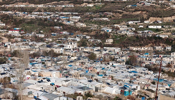 A drone view shows refugee tents in the country side of Idlib, Syria, January 3, 2026. — Reuters