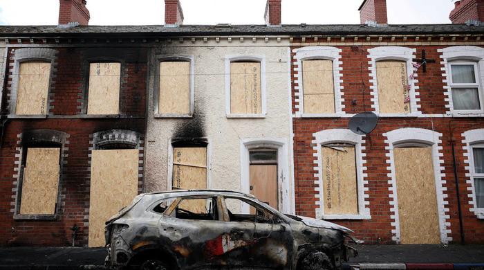 Knife attack victim's family calls for calm after anti-immigrant violence in Belfast