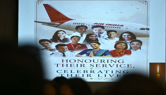 Family members of the crew of Air India Flight 171 plane crash pay tribute during a memorial service on its first anniversary, in Mumbai on June 12, 2026.— AFP