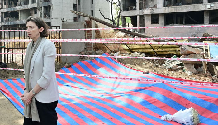 Lindy Cameron, British High Commissioner to India pays tribute at Air India Flight 171 plane crash site on its first anniversary in Ahmedabad on June 12, 2026.— AFP