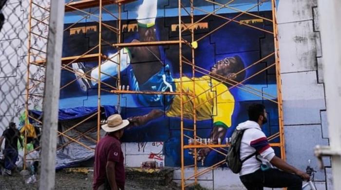 Brazil World Cup street art returns as football fever grips Rio de Janeiro