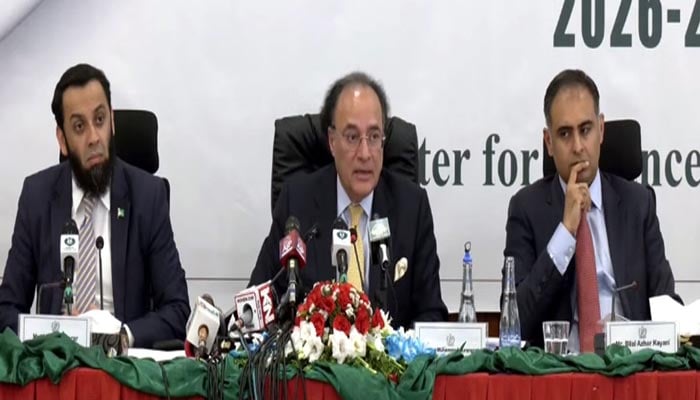 Finance Minister Muhammad Aurangzeb, along with Information Minister Attaullah Tarar (left) and Minister of State on Finance Bilal Azhar Kayani (right), addresses a post-budget press briefing in Islamabad, Pakistan, June 13, 2026. — Screengrab via YouTube/Geo News