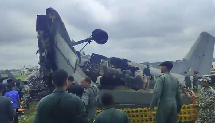 Debris of a Russian-made Indian military plane An-32 crashed while landing at Jorhat on June 13, 2026. — Indian media