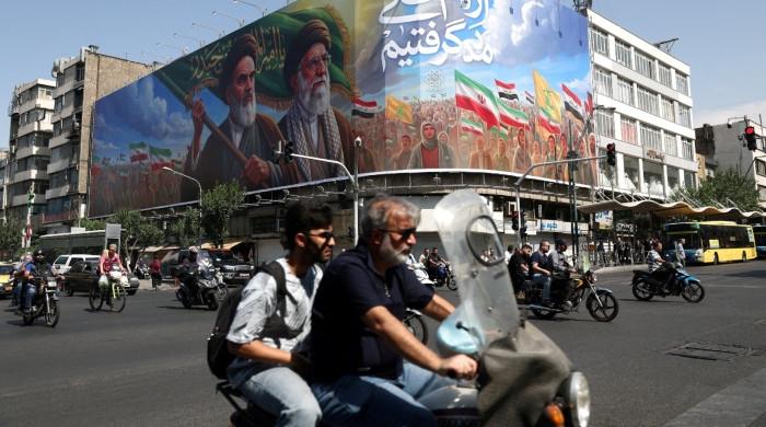 Iran peace deal looms while new military action flares near Strait of Hormuz