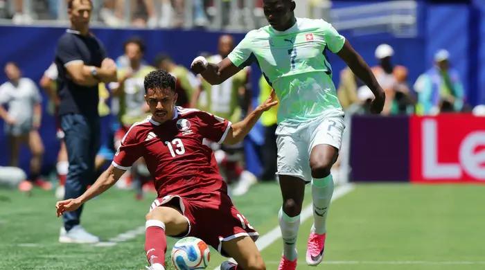 Qatar hail first World Cup point after late header stuns Switzerland in 1-1 draw 