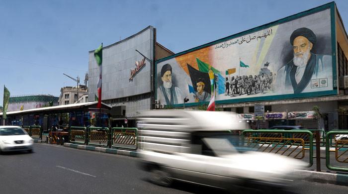 Iran says draft US deal includes oil sanctions waiver, nuclear limits and asset release