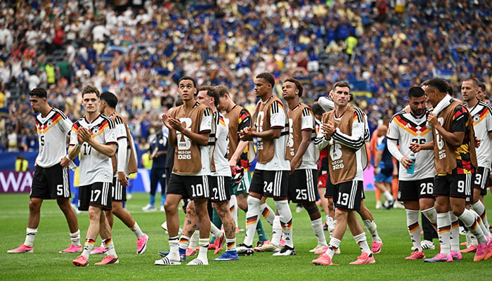 Germany players applaud fans after match, Houston Stadium, Houston, Texas, US, June 14, 2026. — Reuters