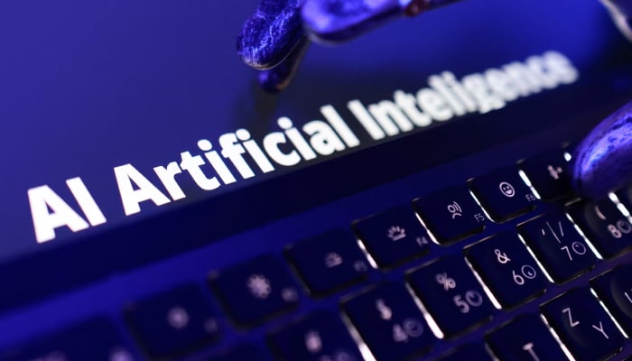 Words AI Artificial Inteligence, keyboard, and a robotic hand in this illustration taken June 5, 2026. — Reuters
