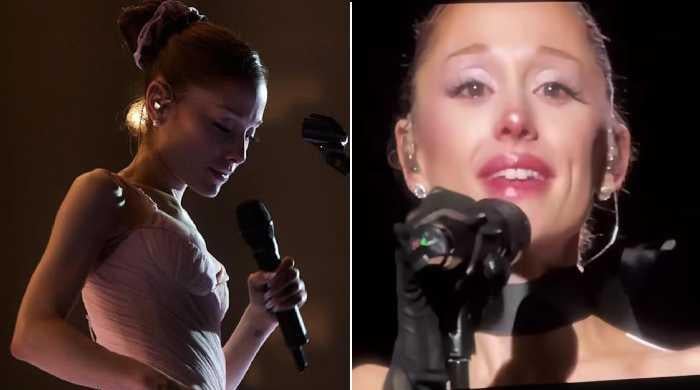 Ariana Grande tearfully thanks fans for being 'still by my side'