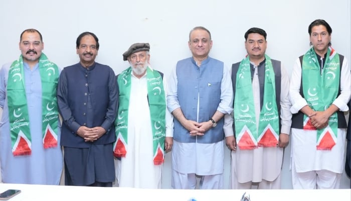 Federal Minister and IPP President Abdul Aleem Khan (third from right) with newly joined GB Assembly members in Gilgit, June 16, 2026. — X/@istehkamPK