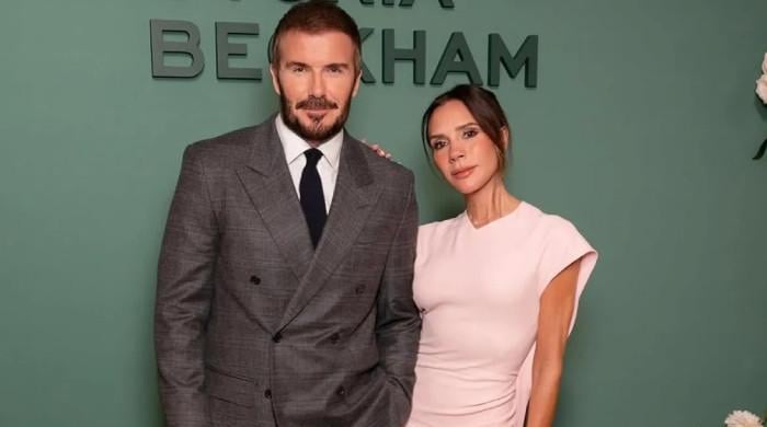 Victoria Beckham wants her own spotlight as David collects major honours