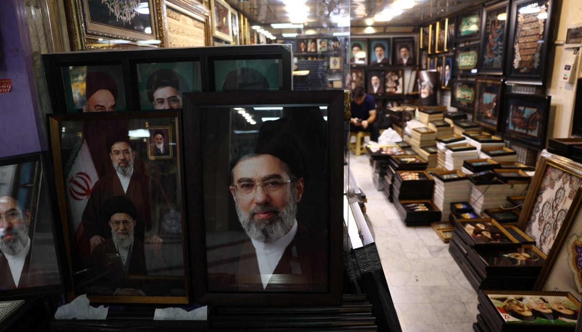 On March 9, 2026, Mojtaba Khamenei was named Irans Supreme Leader.  Mojtaba Khameneis pictures along with those of late Supreme Leader Ayatollah Ali Khamenei are displayed in a store in Tehran, Iran June 7, 2026. — Reuters