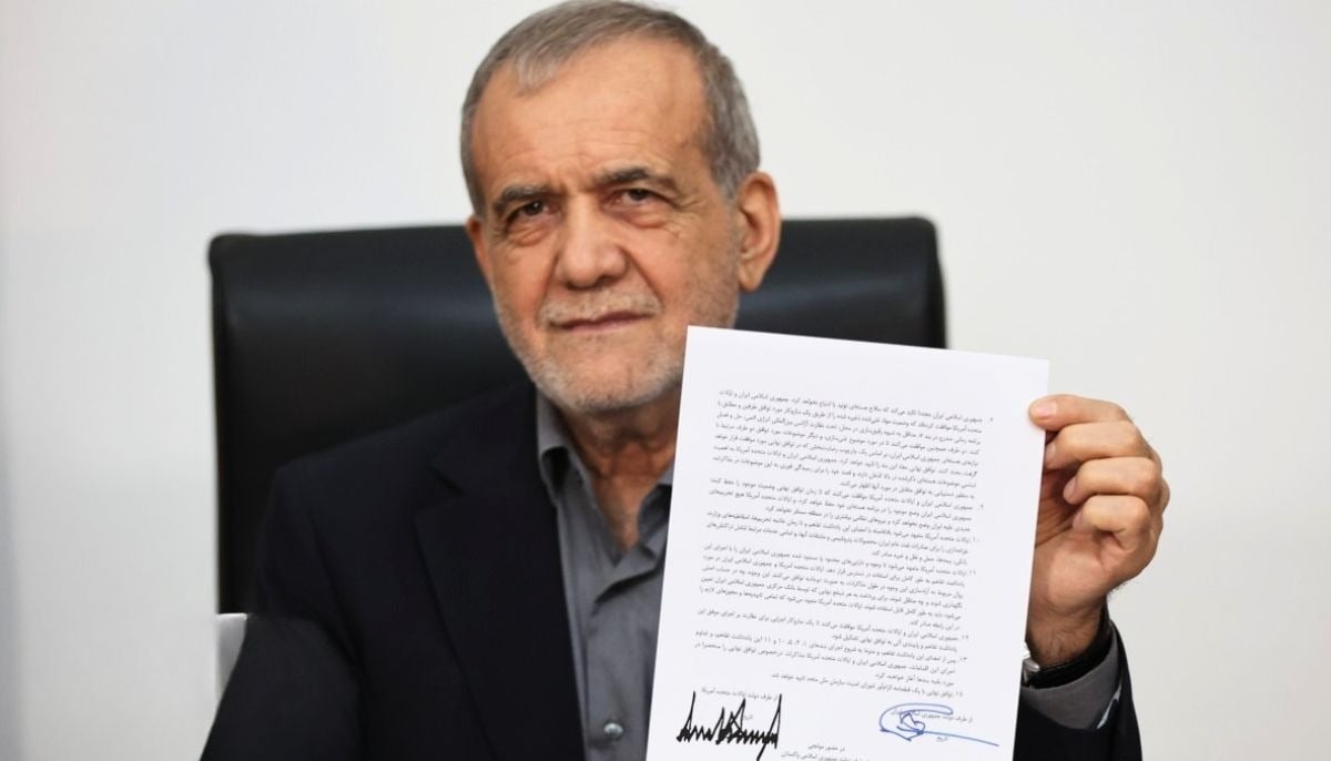 Iran’s President Masoud Pezeshkian shows a signed deal to end Middle East war on June 17, 2026. — @X@Iran_GOV