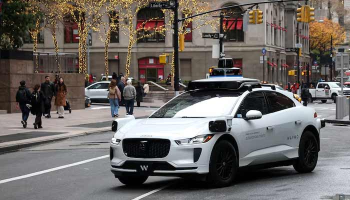 Waymo driverless taxi drives in lower Manhattan in New York City, US, November 26, 2025.— Reuters
