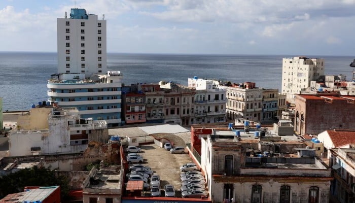 Cuban lawmakers approve sweeping reforms to socialist model amid US pressure 10 A parking lot for tourist rental cars on a rooftop amidst residential buildings before the Cuban government presents far-reaching economic measures that could mark the most significant shift toward a market economy since the 1959 revolution, in Havana, Cuba, June 17, 2026. — Reuters