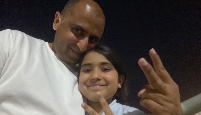 Nine-year-old Hania Adeel pictured with her father Adeel Ahmed in this undated image. — Geo News