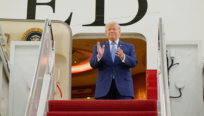 US President Donald Trump applauds as he tours the VC-25B aircraft gifted by Qatar that will be used as Air Force One, at Joint Base Andrews, Maryland, US, June 19, 2026. — Reuters