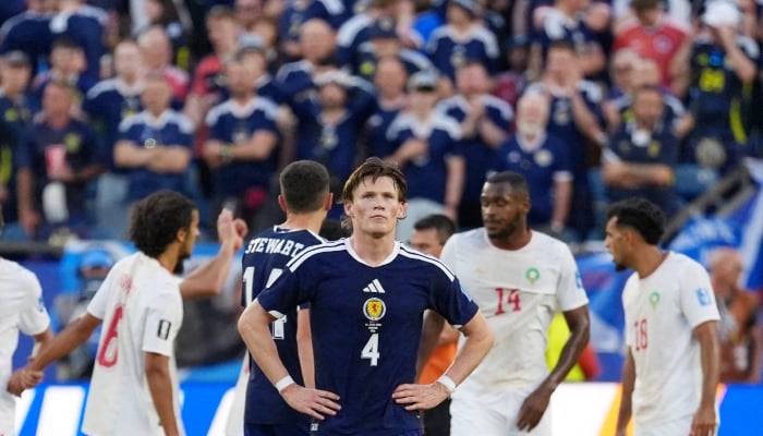 Scotlands Scott McTominay looks dejected after the match. — Reuters
