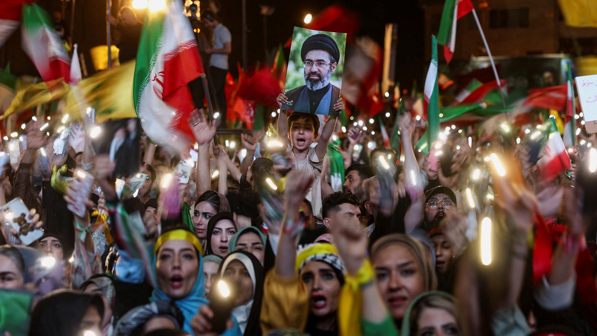 A child holds an image of Irans Supreme Leader, Mojtaba Khamenei, during an anti-US and Israeli rally after Irans missile attack on Israel, in Tehran, Iran, June 7, 2026. — Reuters
