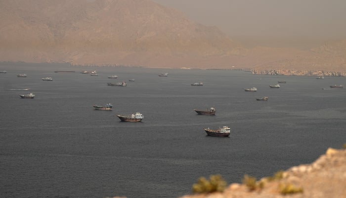 Vessels at the Strait of Hormuz, as seen from Musandam, Oman, June 18, 2026. — Reuters