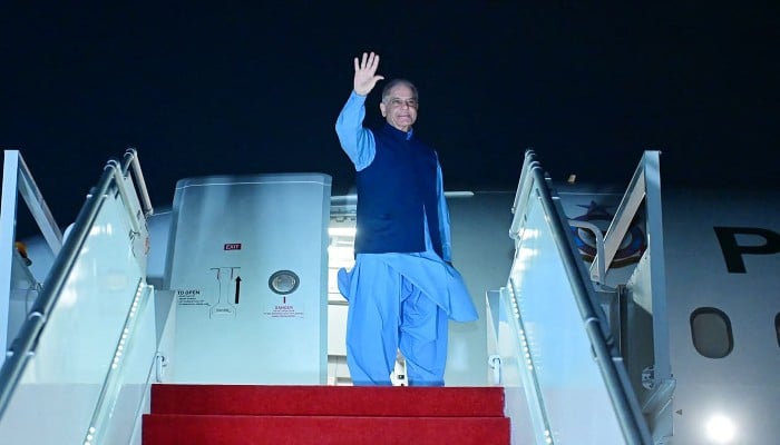 This handout photograph, taken and released by the Prime Ministers Office on June 21, 2026, shows Prime Minister Shehbaz Sharif departing for Burgenstock, Switzerland, from Nur Khan Air Base in Rawalpindi. — AFP