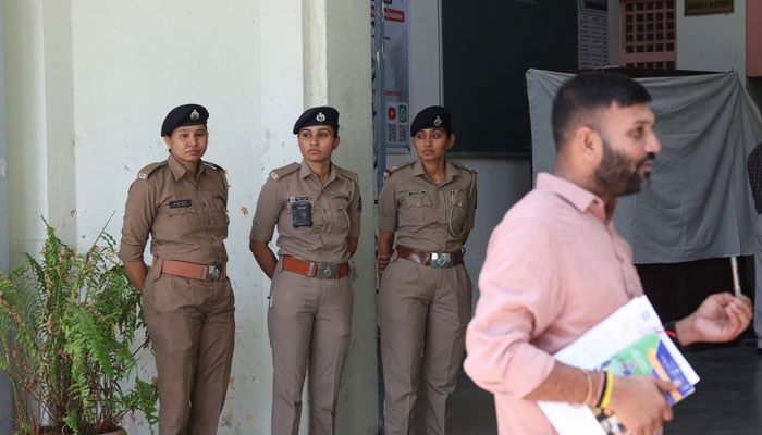 Police personnel stand guard outside an examination centre on the eve of NEET (National Eligibility cum Entrance Test) retest in Ahmedabad, India, June 20, 2026. — Reuters