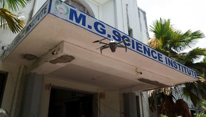 A police surveillance drone flies outside an examination center on the eve of NEET (National Eligibility cum Entrance Test) retest in Ahmedabad, India June 20, 2026.— Reuters