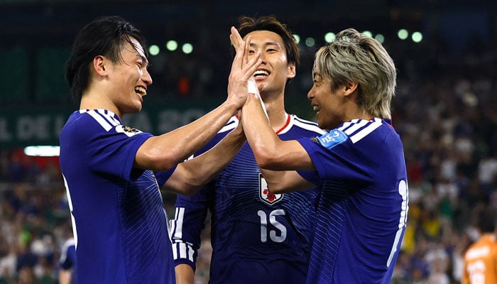Japans Junya Ito celebrates scoring their third goal with Japans Ayase Ueda and Japans Daichi Kamada during Group F match between Tunisia v Japan in Fifa World Cup 2026 in Estadio Monterrey, Monterrey, Mexico on June 20, 2026. — Reuters