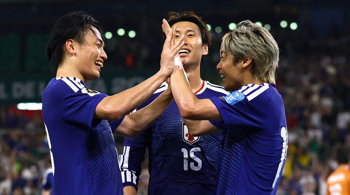Japan rout Tunisia 4-0 as Ueda shines in World Cup's 1,000th match