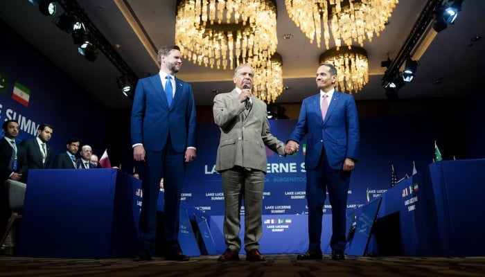 US Vice President JD Vance looks on as Prime Minister Shehbaz Sharif speaks while holding the hand of Qatars Prime Minister and Minister for Foreign Affairs Sheikh Mohammed bin Abdulrahman bin Jassim Al-Thani, at Buergenstock Resort Lake Lucerne, near Stansstad, Switzerland, June 21, 2026. — Reuters