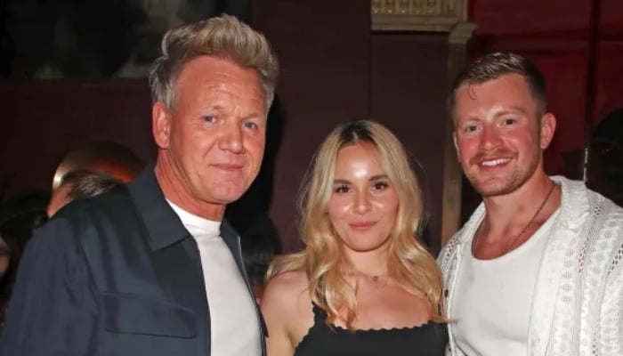 Holly announced her pregnancy alongside a snap of herself and Adam, with her growing bump on display in a Calvin Klein bralet