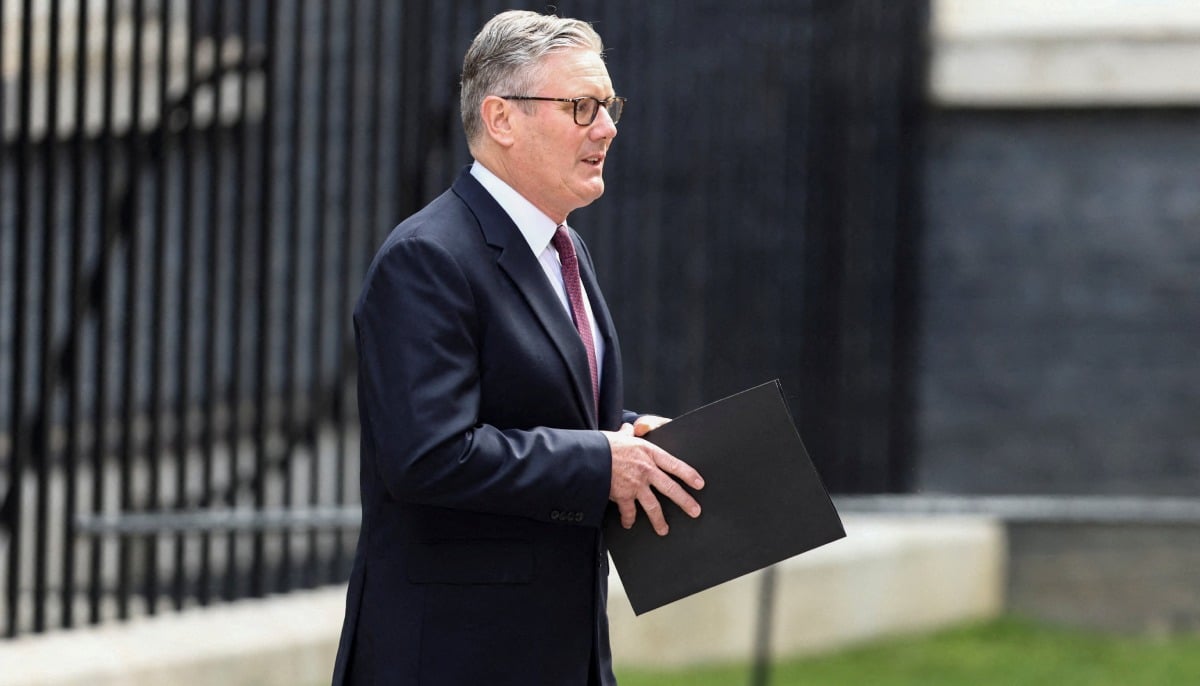 British Prime Minister Keir Starmer walks on the day he announces the timeline for his resignation, outside 10 Downing Street, in London, Britain, June 22, 2026. — Reuters