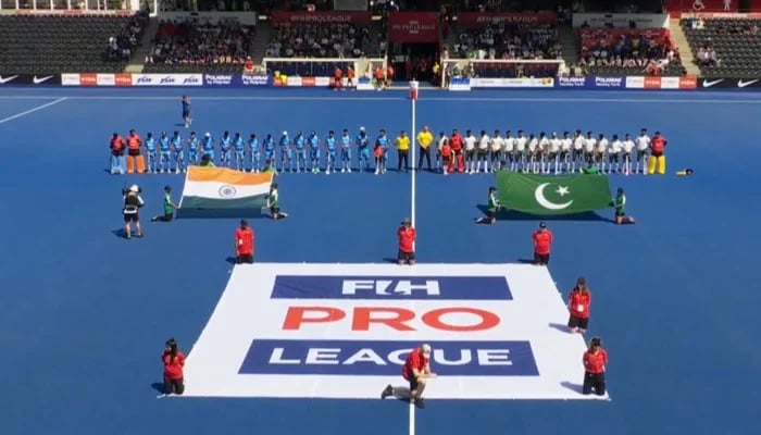 Organisers display wrong Pakistan flag (right) as national players line up for the national anthem ahead of their FIH Pro League match against India at the Lee Valley Hockey and Tennis Centre in London on June 23, 2026. — Screengrab via Livestream