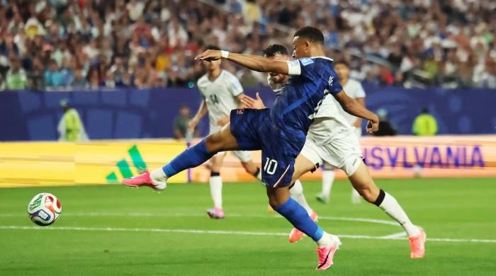 Mbappe double sends France into knockout rounds after lengthy weather delay