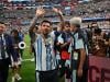 Argentina ease into round of 32 as Messi writes history