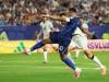 Mbappe double sends France into knockout rounds after lengthy weather delay