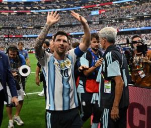 Argentina ease into round of 32 as Messi writes history