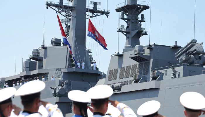 Sailors salute during the commissioning ceremony of the new multipurpose destroyer Choe Hyon at Nampho port, North Korea, June 23, 2026, in this picture released by North Koreas official Korean Central News Agency.— Reuters