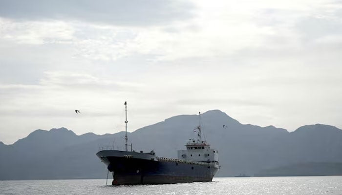 A vessel in the Strait of Hormuz, off the coast of Oman’s Musandam province, April 12, 2026. — Reuters